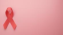 Red ribbon on pink background
